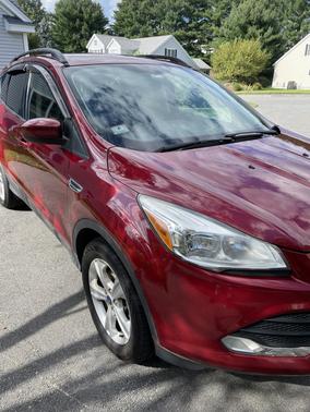 Red 2014 Ford Escape SE