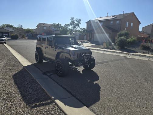 Beige 2017 Jeep Wrangler Unlimited Sport