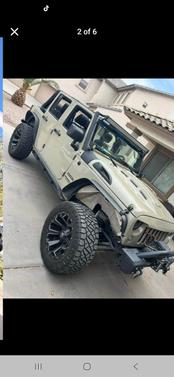 Beige 2017 Jeep Wrangler Unlimited Sport