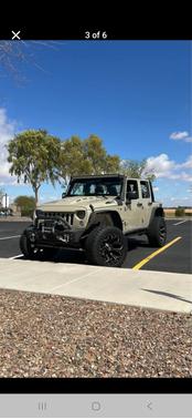 Beige 2017 Jeep Wrangler Unlimited Sport