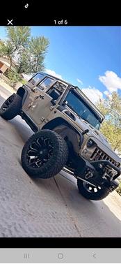 Beige 2017 Jeep Wrangler Unlimited Sport