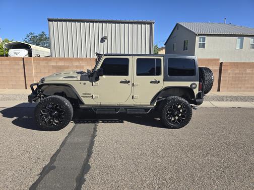 Beige 2017 Jeep Wrangler Unlimited Sport