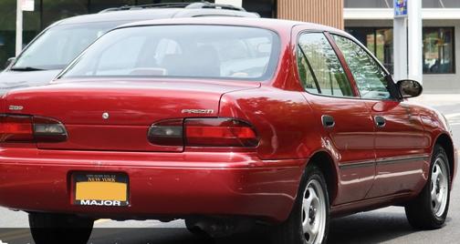 Red 1996 Geo Prizm LSi