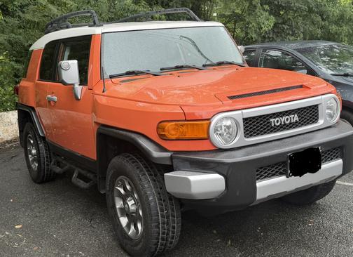 Orange 2013 Toyota FJ Cruiser Base