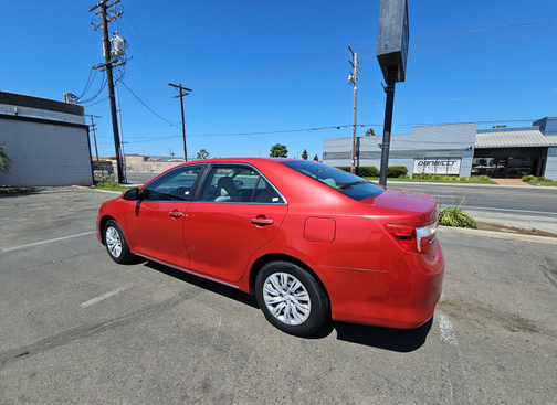 Red 2014 Toyota Camry LE