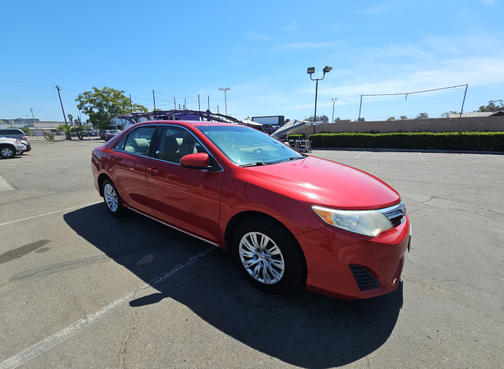 Red 2014 Toyota Camry LE