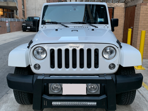 White 2015 Jeep Wrangler Sahara