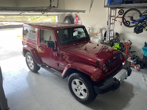 Red 2011 Jeep Wrangler Sahara