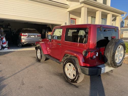 Red 2011 Jeep Wrangler Sahara