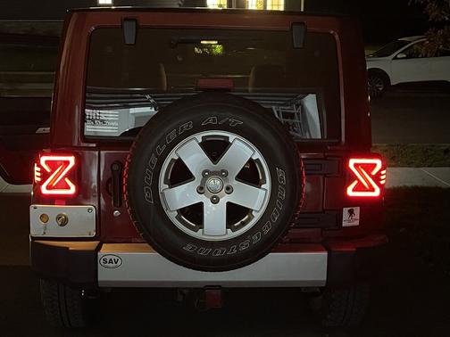 Red 2011 Jeep Wrangler Sahara