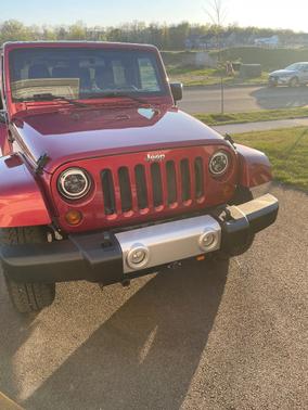 Red 2011 Jeep Wrangler Sahara