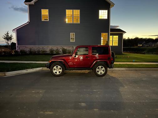 Red 2011 Jeep Wrangler Sahara