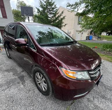 Red 2015 Honda Odyssey EX
