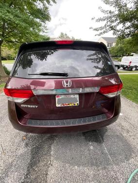 Red 2015 Honda Odyssey EX