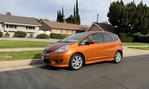 Orange 2011 Honda Fit Sport