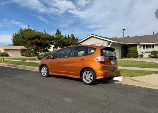 Orange 2011 Honda Fit Sport