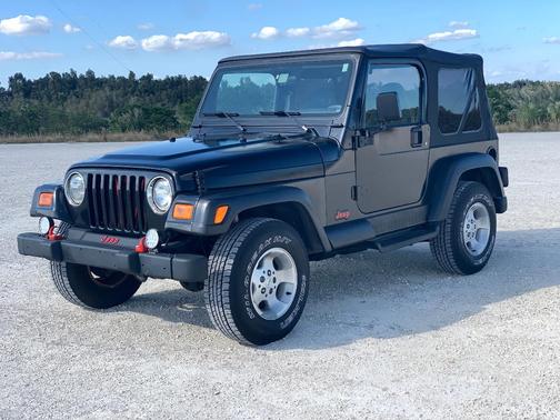 Black 1999 Jeep Wrangler Sahara
