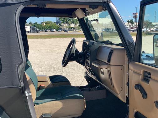 Black 1999 Jeep Wrangler Sahara