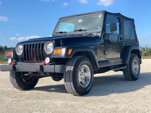 Black 1999 Jeep Wrangler Sahara