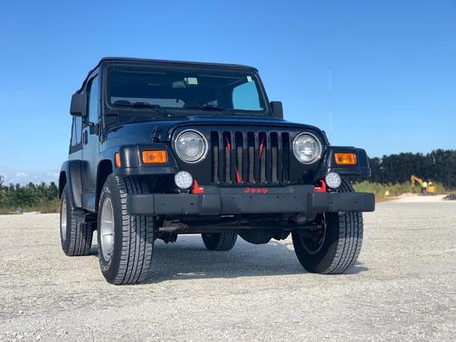 Black 1999 Jeep Wrangler Sahara