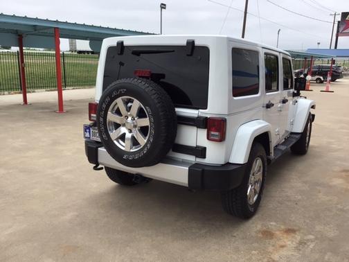 Photo 3 of 11 of 2015 Jeep Wrangler Unlimited Sahara