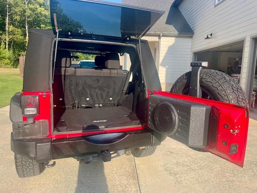 Red 2015 Jeep Wrangler Unlimited Willys Wheeler