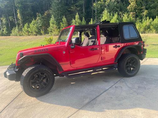 Red 2015 Jeep Wrangler Unlimited Willys Wheeler