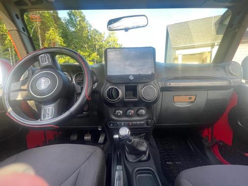 Red 2015 Jeep Wrangler Unlimited Willys Wheeler