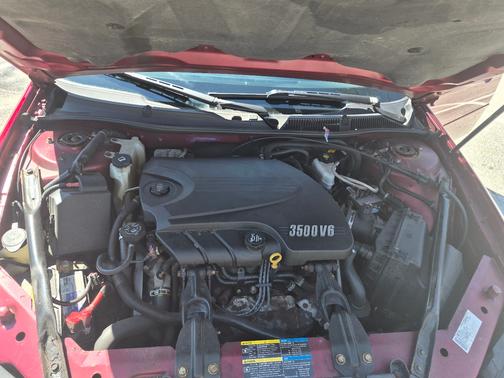 Red 2009 Chevrolet Impala LT