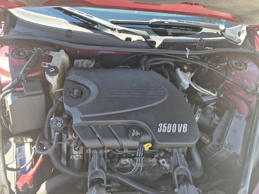 Red 2009 Chevrolet Impala LT