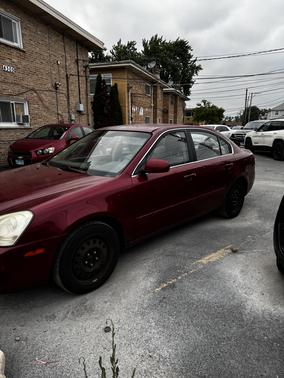 Red 2006 Kia Optima EX