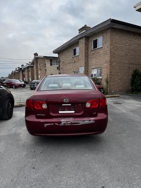 Red 2006 Kia Optima EX