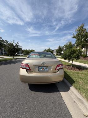 Gold 2010 Toyota Camry LE