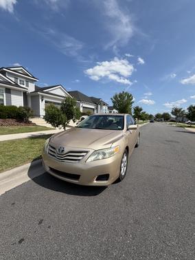 Gold 2010 Toyota Camry LE