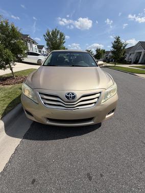 Gold 2010 Toyota Camry LE