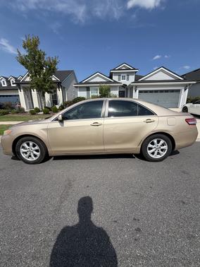 Gold 2010 Toyota Camry LE