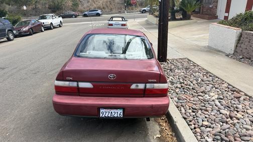 Red 1996 Toyota Corolla DX
