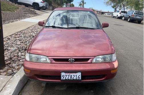 Red 1996 Toyota Corolla DX