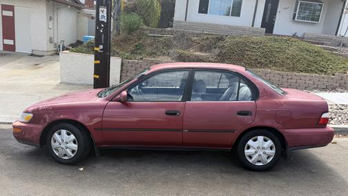 Red 1996 Toyota Corolla DX