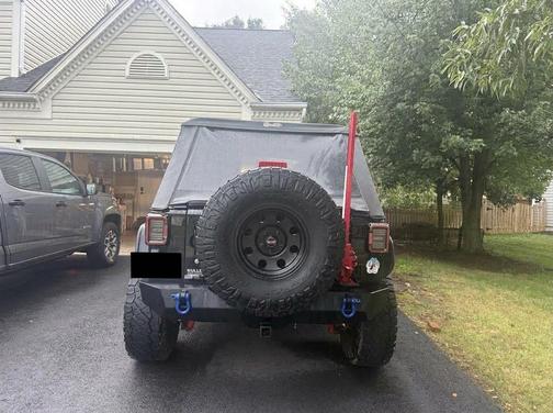 Black 2015 Jeep Wrangler Unlimited Sport