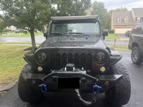 Black 2015 Jeep Wrangler Unlimited Sport
