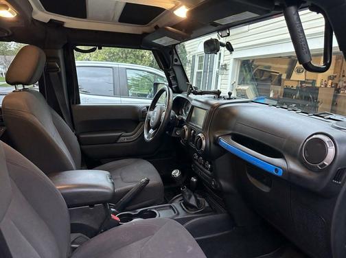 Black 2015 Jeep Wrangler Unlimited Sport