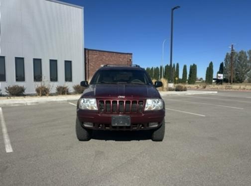 Red 2000 Jeep Grand Cherokee Limited 4WD