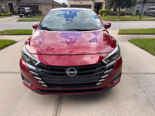 Red 2025 Nissan Versa SV