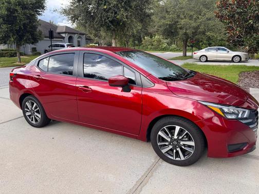 Red 2025 Nissan Versa SV