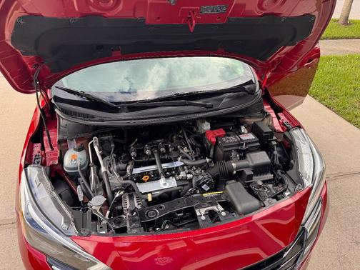 Red 2025 Nissan Versa SV