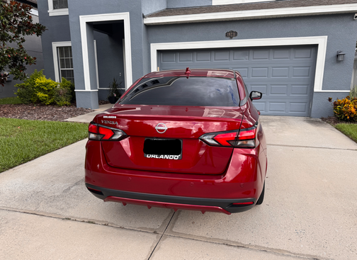 Red 2025 Nissan Versa SV