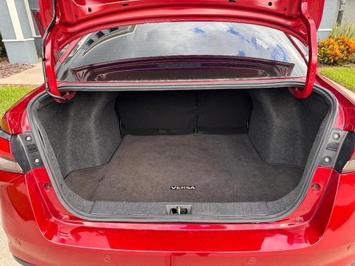 Red 2025 Nissan Versa SV
