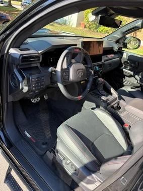 Black 2025 Toyota Tacoma Hybrid TRD Pro