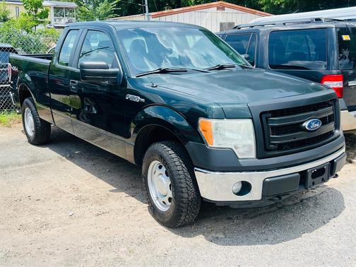 Green 2014 Ford F-150 XLT